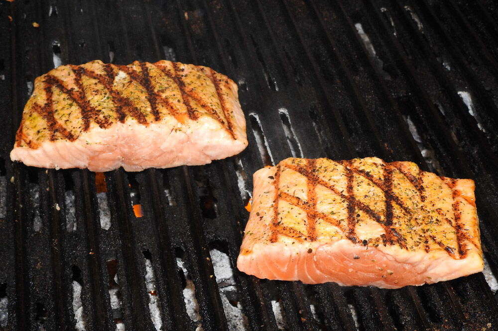 Salmon being grilled